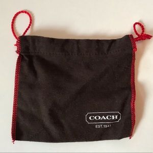 Brown Coach dust bag with red details